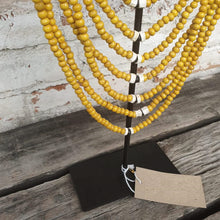Load image into Gallery viewer, Beaded strands &amp;  Cowrie Shell Necklace Decor with stand in Yellow - bohemian-beach-house
