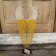 Laden Sie das Bild in den Galerie-Viewer, Beaded strands &amp;  Cowrie Shell Necklace Decor with stand in Yellow - bohemian-beach-house
